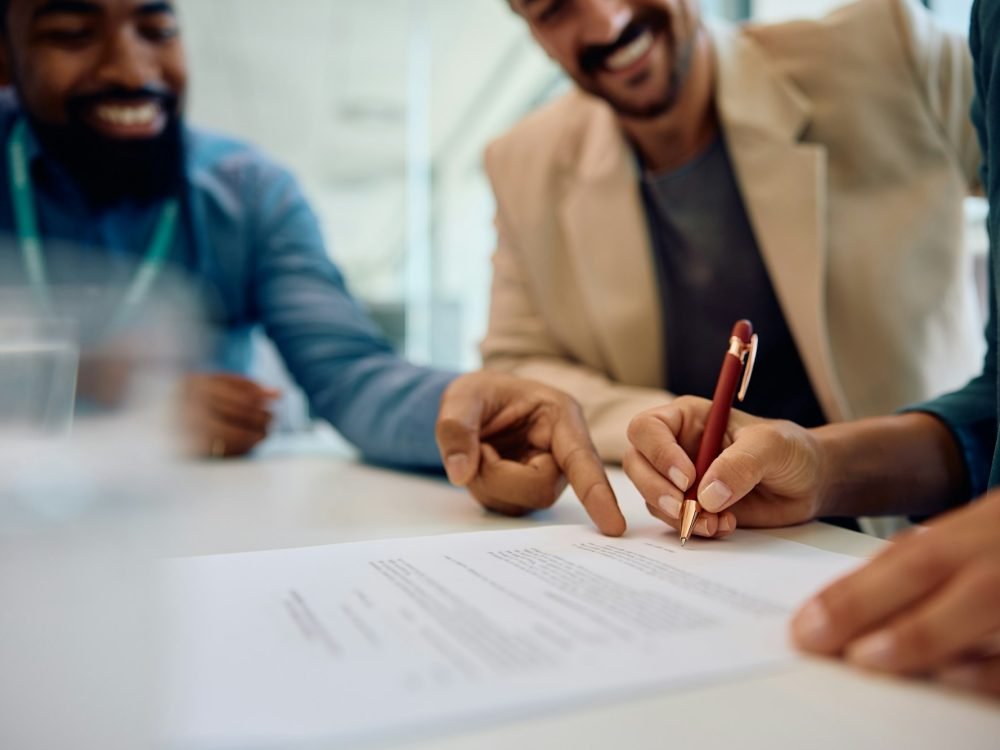 Signing a contract with insurance agent!